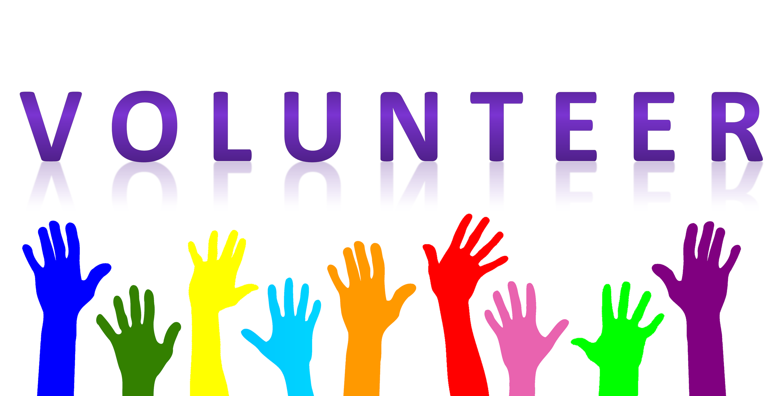 Multi-coloured raised hands under the word VOLUNTEER